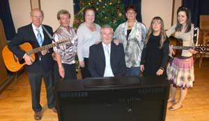 The newly formed Derryvolgie Singers pictured at the ‘Festival of Nine Lessons and Carols’ in St Columba’s, Derryvolgie.  L to R: Jim Hamilton, Liz Spence, Thelma Campbell, Karen McIvor, Emma-Louise Spence, Lindsay Hamilton and Graham Murphy (seated at keyboard).